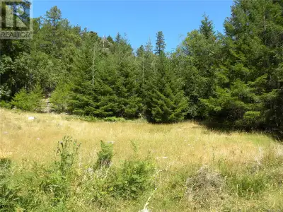 10.34 acres of land on lovely Lasqueti Island! This very private property is in a fabulous location...