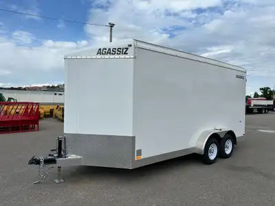 Agassiz 7x16 cargo trailer w/rear barn door, and 2 3,500Lb torsion axles. Standard Options: Rubber T...