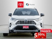 The 2019 Toyota RAV4 Hybrid XSE in pristine white exudes confidence on the road with its capable AWD... (image 1)