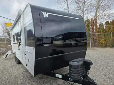 Winnebago Thrive travel trailer 24RKS highlights: Olympic Queen Bed Front Viewing Window 30" x 36" S...