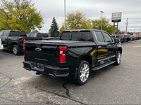 The 2023 Chevrolet Silverado 1500 High Country is an impressive black 4x4 truck that combines power... (image 5)