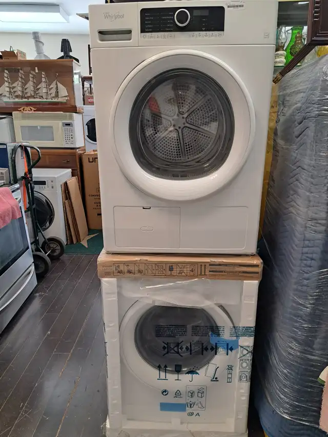 Stacked washer and dryer. Apt size.628632606472991213