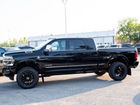 Adds: 2 Inch BDS Lift With NX Shocks & Black Shock Boots 20x10 Hostile Typhoon Wheels 35X12.50R20 Yo... (image 4)