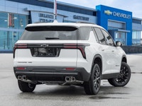 The 2026 Chevrolet Traverse LT AWD stands out in a bold White finish that complements its wide, athl... (image 4)