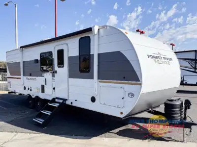 The 2026 Wildwood 26DBUD by Forest River is a spacious and family-friendly travel trailer designed t...