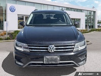 Navigate every journey with confidence and ease in the striking Black 2018 Volkswagen Tiguan Trendli... (image 4)
