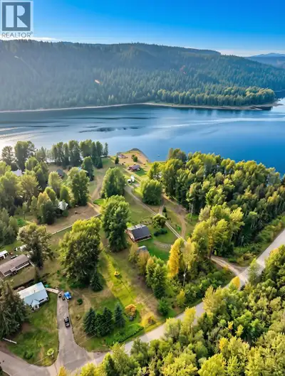 Quesnel Lake views, outdoor adventure, and comfortable lakeview living! This beautifully maintained...