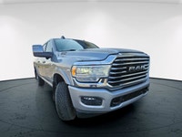Introducing the powerful 2023 Ram 3500 Limited Longhorn in a eye-catching silver color, boasting a 4... (image 1)