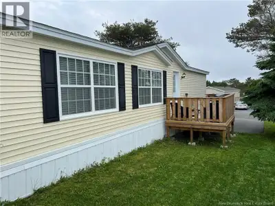 Welcome home to this beautifully maintained 6-year-old mini home that is sure to check all your boxe...