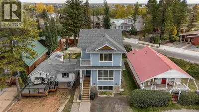 STEPS FROM SYLVAN LAKE! This charming freshly painted 2 storey located in Cottage Area is sure to im...