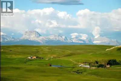Tucked away on a quiet dead-end road just 10 minutes west of Cardston, this exceptional 10-acre acre...