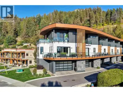 Set in the heart of Peachland’s vibrant waterfront, this architecturally striking residence by Lakep...