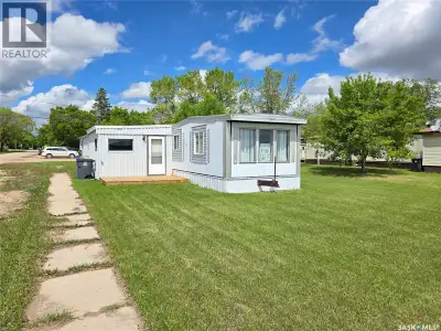 Affordable living in the heart of Arcola! This mobile home sits on a corner lot and features a brigh...