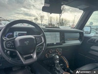 Propel your adventures with the formidable 2021 Ford Bronco. This remarkable used convertible, finis... (image 9)