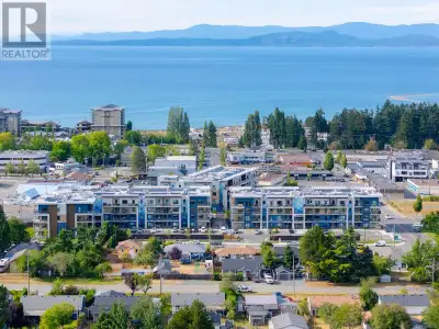 TOP FLOOR. SOUTH FACING. 2 PARKING SPOTS. Welcome to Mosaic, Parksville’s premier green-built housin...