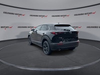 // ACCIDENT FREE!! // Finished in Black with a Burgundy interior, this used 2022 Mazda CX-30 GT w/Tu... (image 5)