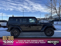 This Jeep Wrangler delivers a Gas/Electric V-6 3.6 L/220 engine powering this Automatic transmission... (image 7)
