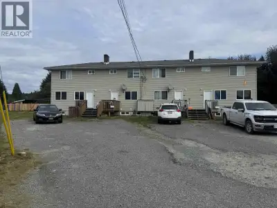 Excellent investment property! This well-situated fourplex features two 3-bedroom/l-bath end units a...