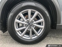 2024 Mazda CX-5 Le Mazda CX-5 2024 GS AWD conserve l'élégance caractéristique de Mazda avec un desig... (image 8)
