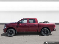 Experience the hardworking capability of this 2021 Ram 2500. Finished in bold Pearl Red with a Black... (image 1)
