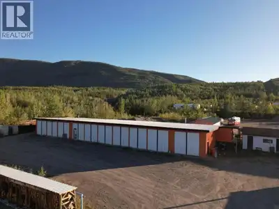 Unique Commercial Opportunity in Faro. 5,000 sq. ft. former bus garage with 10 bays (5 concrete, 5 d...