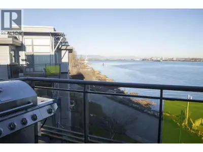 Beautiful 2 bedroom, 2 bath top floor unit with magnificent water view in pristine, resort-like neig...