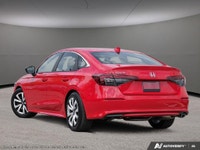 Introducing the stunning 2026 Honda Civic in an eye-catching red, designed to impress with its styli... (image 3)
