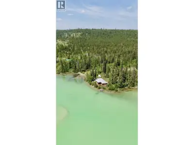 Stunning 3.11-acre waterfront property on Pyper Lake offering a pristine shoreline. Enjoy crystal-cl...