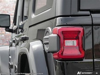 This Jeep Wrangler boasts a Regular Unleaded V-6 3.6 L/220 engine powering this Automatic transmissi... (image 8)