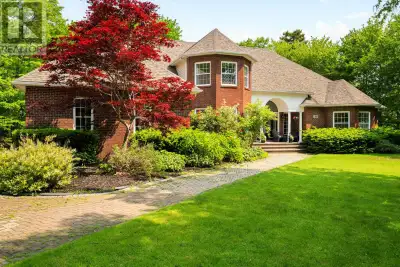 Now THIS is a dream home! Welcome to 14 Club House Lane, a show-stopping estate in the heart of Glen...