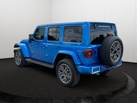 The 2023 Jeep Wrangler High Altitude 4xe combines iconic open-air off-road freedom with executive-le... (image 3)