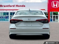 Drive with confidence and sophistication in this immaculate white 2022 Honda Civic Sedan LX. Experie... (image 5)