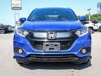 Experience the excitement of driving the **2019 Honda HR-V Sport** in stunning blue, equipped with a... (image 1)