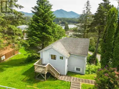 * PREC - Personal Real Estate Corporation. This home is perched on two legal lots, reaching down to...