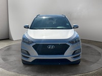 This Hyundai Tucson boasts a Regular Unleaded I-4 2.0 L/122 engine powering this Automatic transmiss... (image 6)