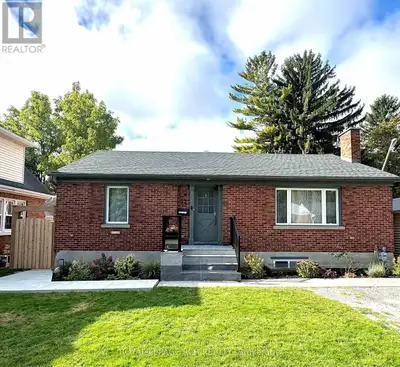 Welcome home to this beautifully updated main floor bungalow that is not to be missed! This sun-fill...