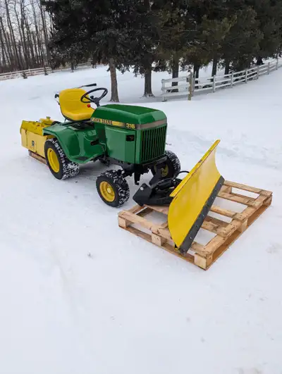 John Deere 316 with Front Blade and Hydraulic rototiller, View more