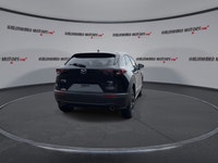 // ACCIDENT FREE!! // Finished in Black with a Burgundy interior, this used 2022 Mazda CX-30 GT w/Tu... (image 6)