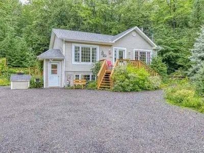 WOW CANTLEY for under $500,000!! Discover this stunning property set on a private lot of over 1.7 ac...
