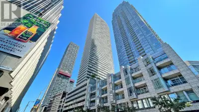 Immaculate, four-year-new one-bedroom suite on a high floor in a sought-after Midtown residence at Y...