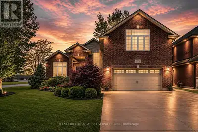 Experience refined living in this custom-built full brick ranch, offering approximately 2,350 sq. ft...