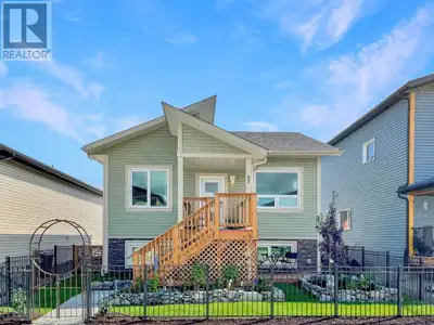 Investor-friendly and income-ready--57 Eugene Avenue is a turn-key legal suite property in Whistle B...