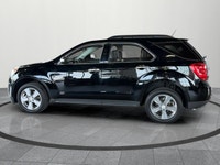 The 2015 Chevrolet Equinox LT is a comfortable and practical SUV that's perfect for commuting, road... (image 2)