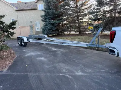 Aluminum tandem axle boat trailer 2 6000lb axles aluminum wheels surge brakes Fully adjustable bunk...