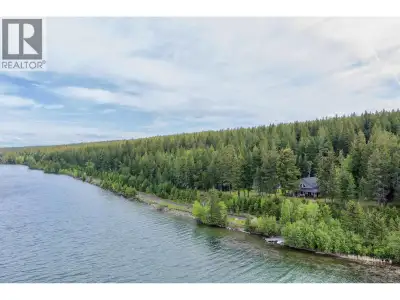 Beautiful 9.9-acre off-grid waterfront acreage on Lac La Hache—perfect for swimming, fishing, boatin...