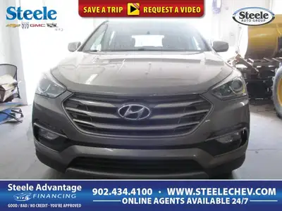 Finished in Silver with a Grey interior, this 2017 Hyundai Santa Fe Sport Base is a practical used S...