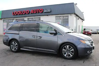 FULLY LOADED Looking for the perfect family vehicle? Check out this 2015 Honda Odyssey Touring! With...