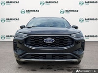 The 2024 Ford Escape ST-Line in sleek black boasts AWD capabilities, making it a versatile and relia... (image 1)