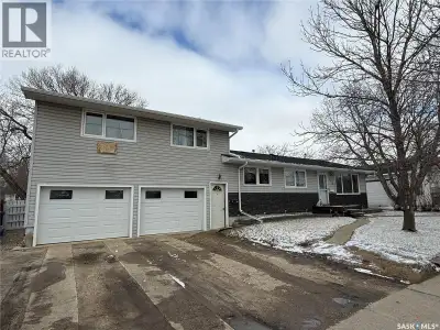 Welcome home to this spacious and thoughtfully designed home featuring 3 main floor bedrooms, includ...
