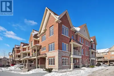 This beautifully maintained corner townhome offers a bright, open layout filled with natural light a...